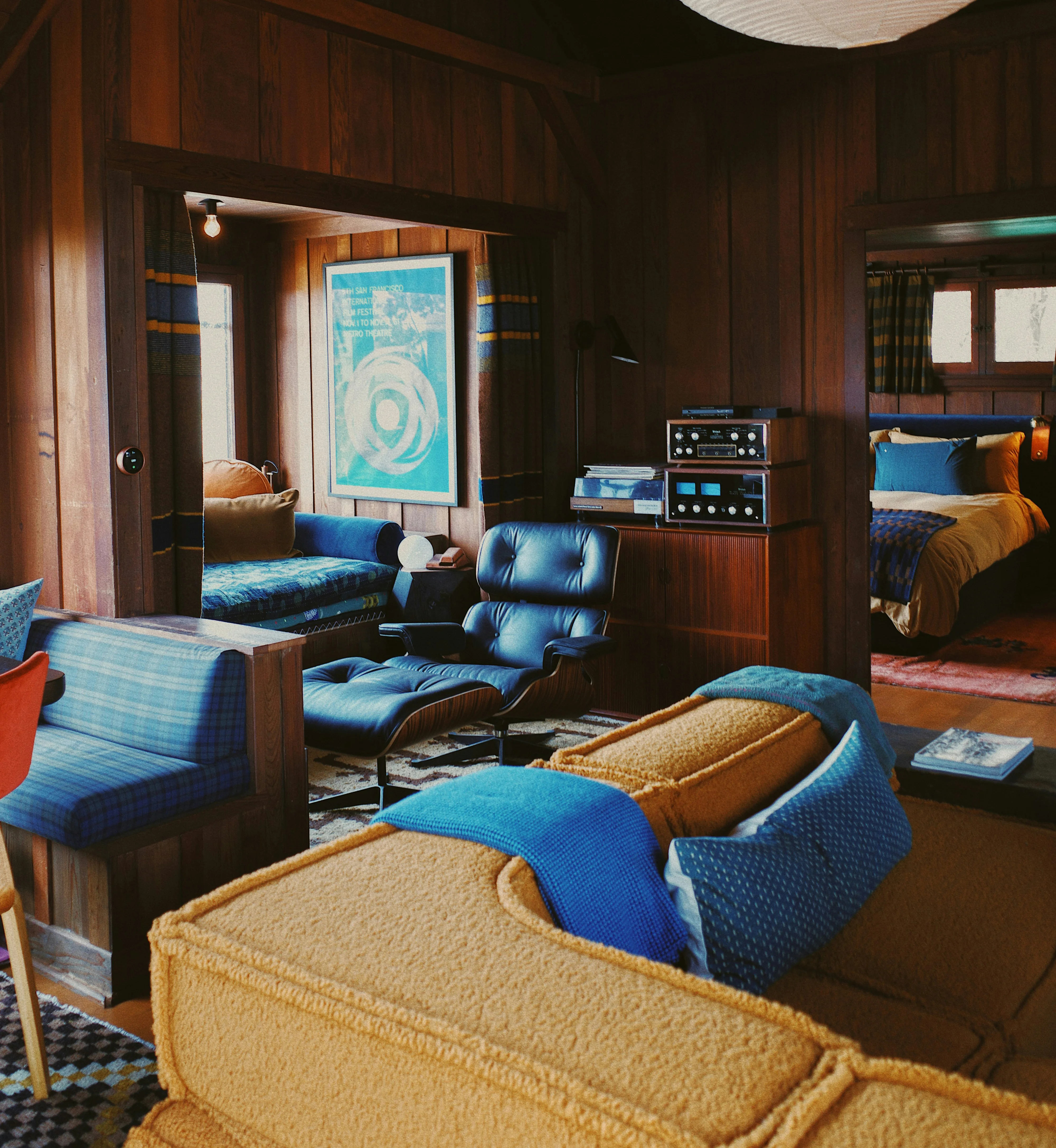 MCM furniture in a moody living space